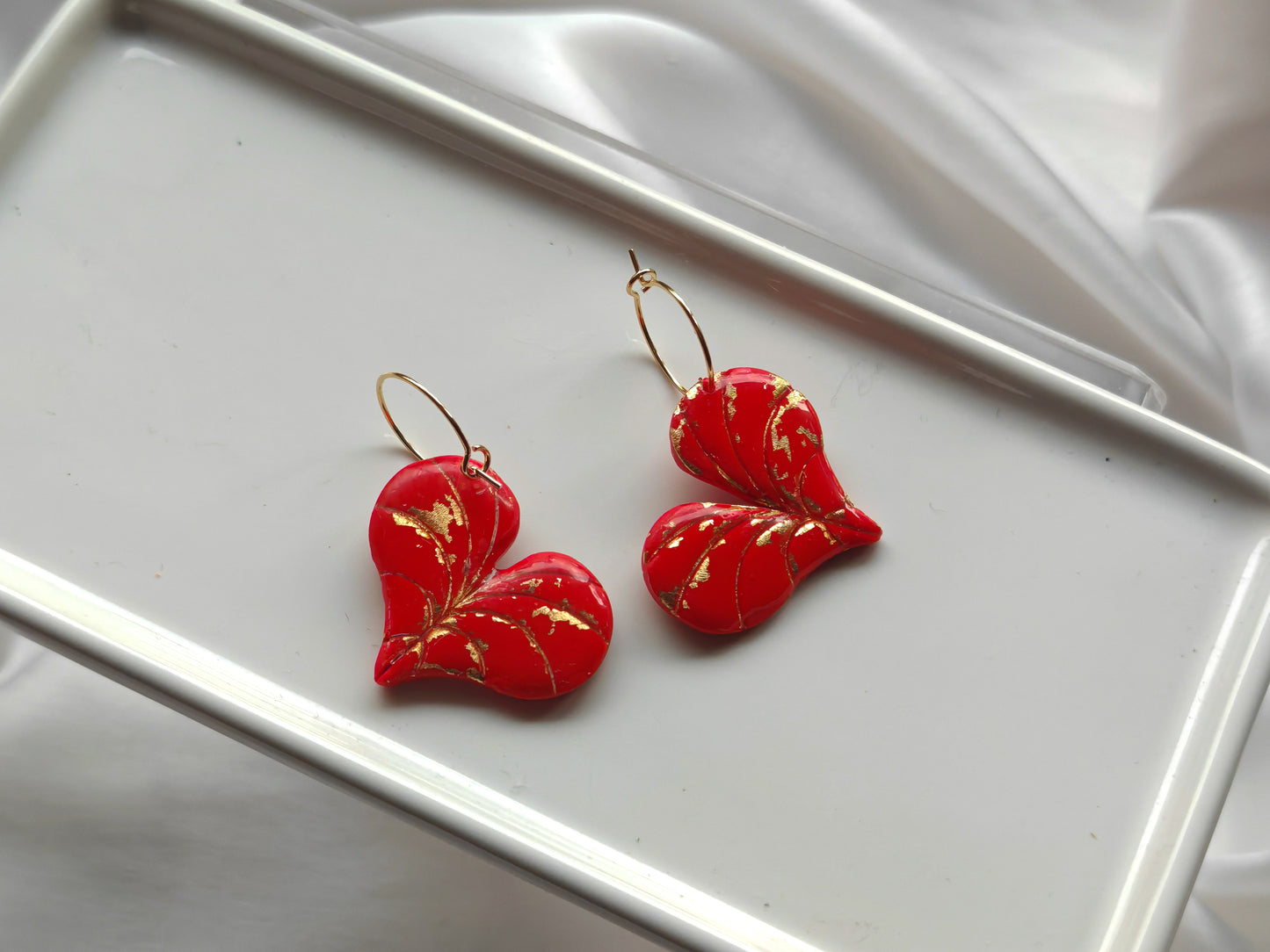 Red and gold heart leaf earrings