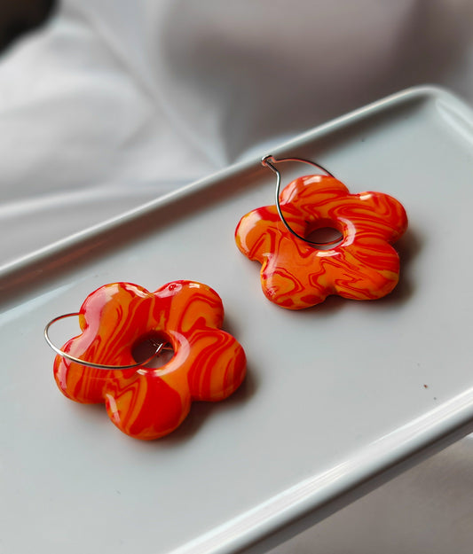 Orange flower hoop earrings