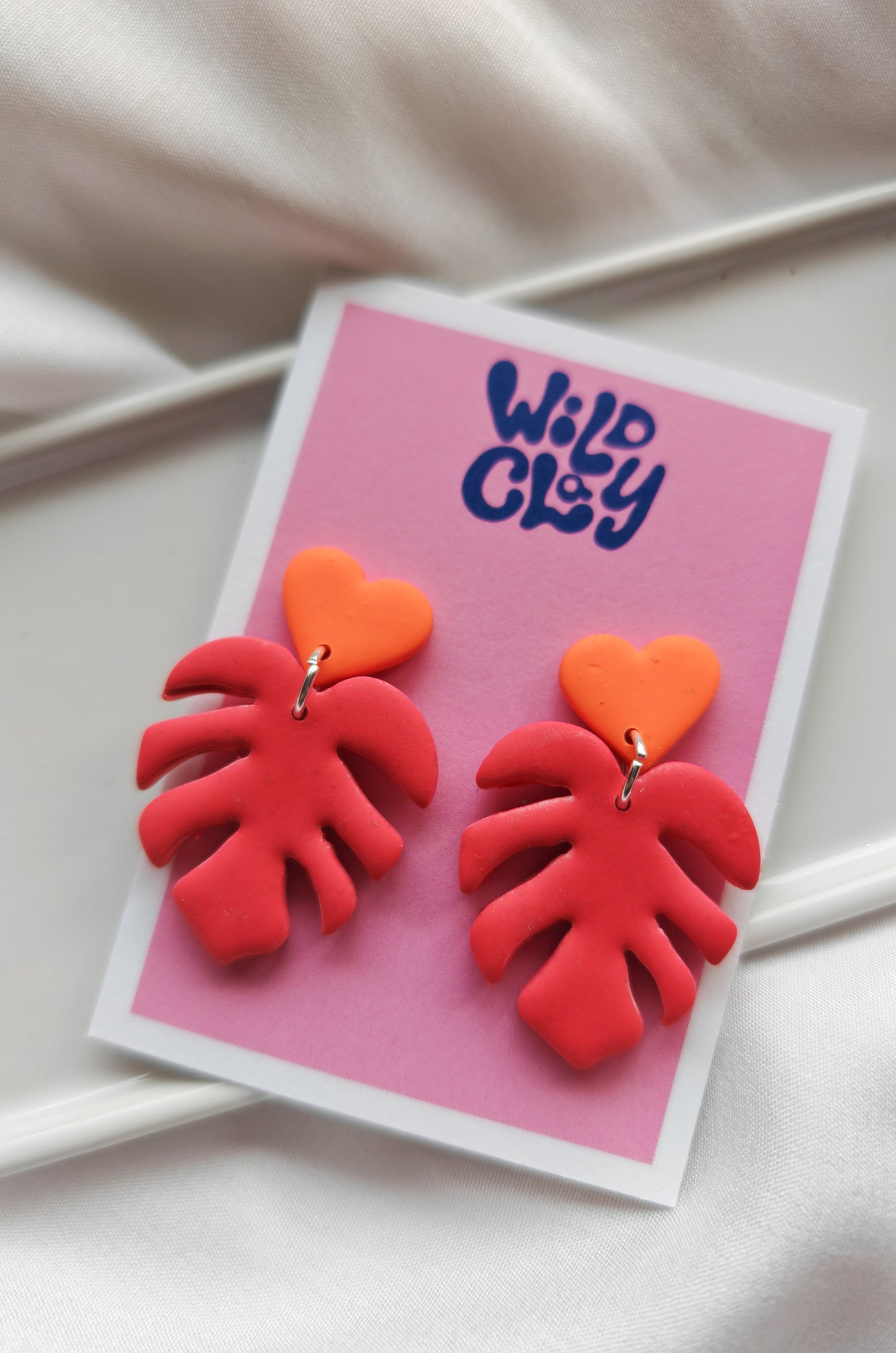 Monstera heart dangle earrings