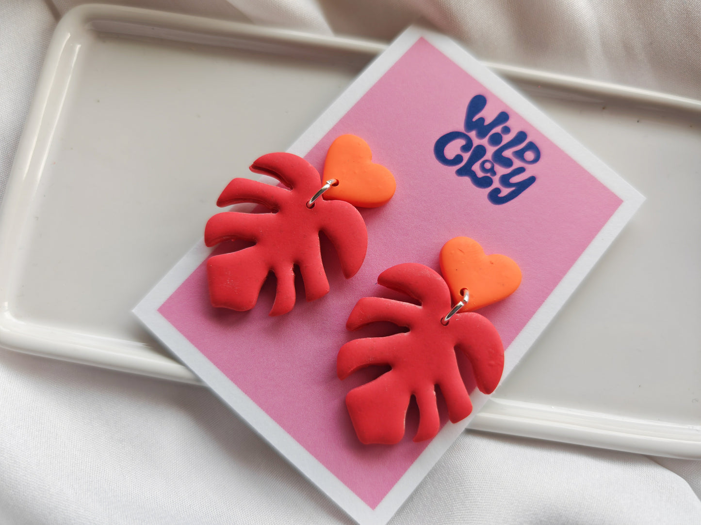 Monstera heart dangle earrings