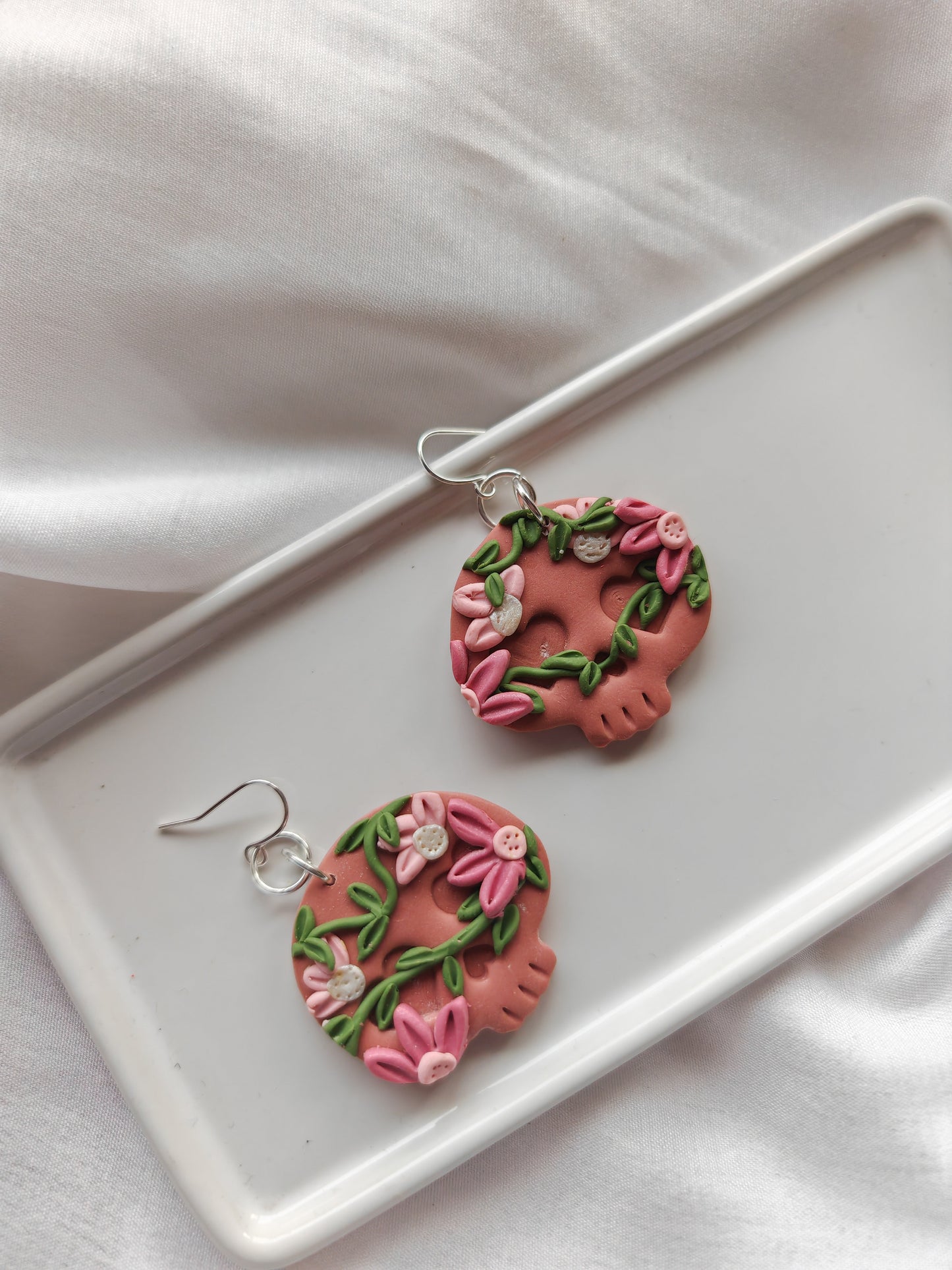 Botanical skull earrings