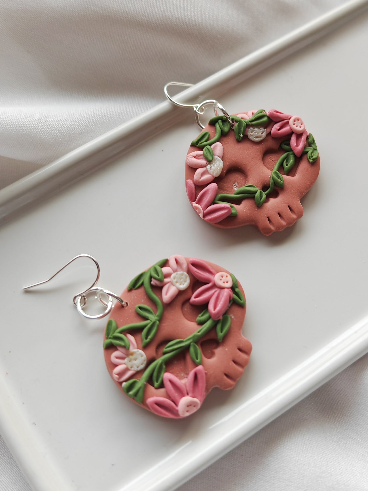 Botanical skull earrings