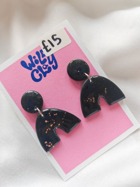 Gold flecked arch earrings