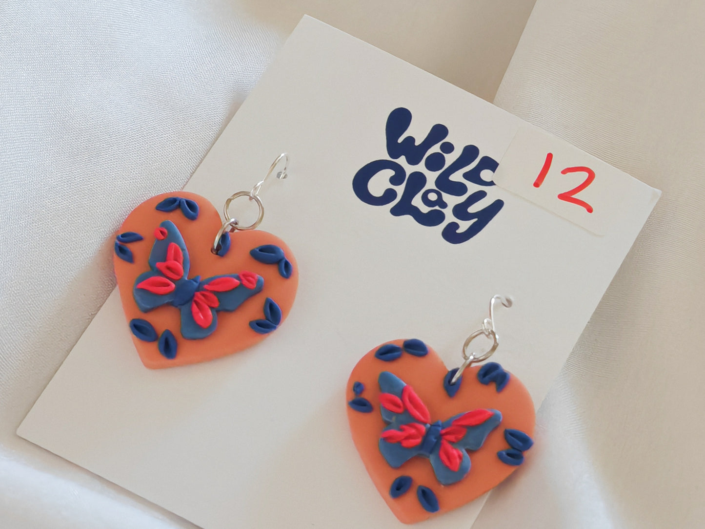 Butterfly heart earrings