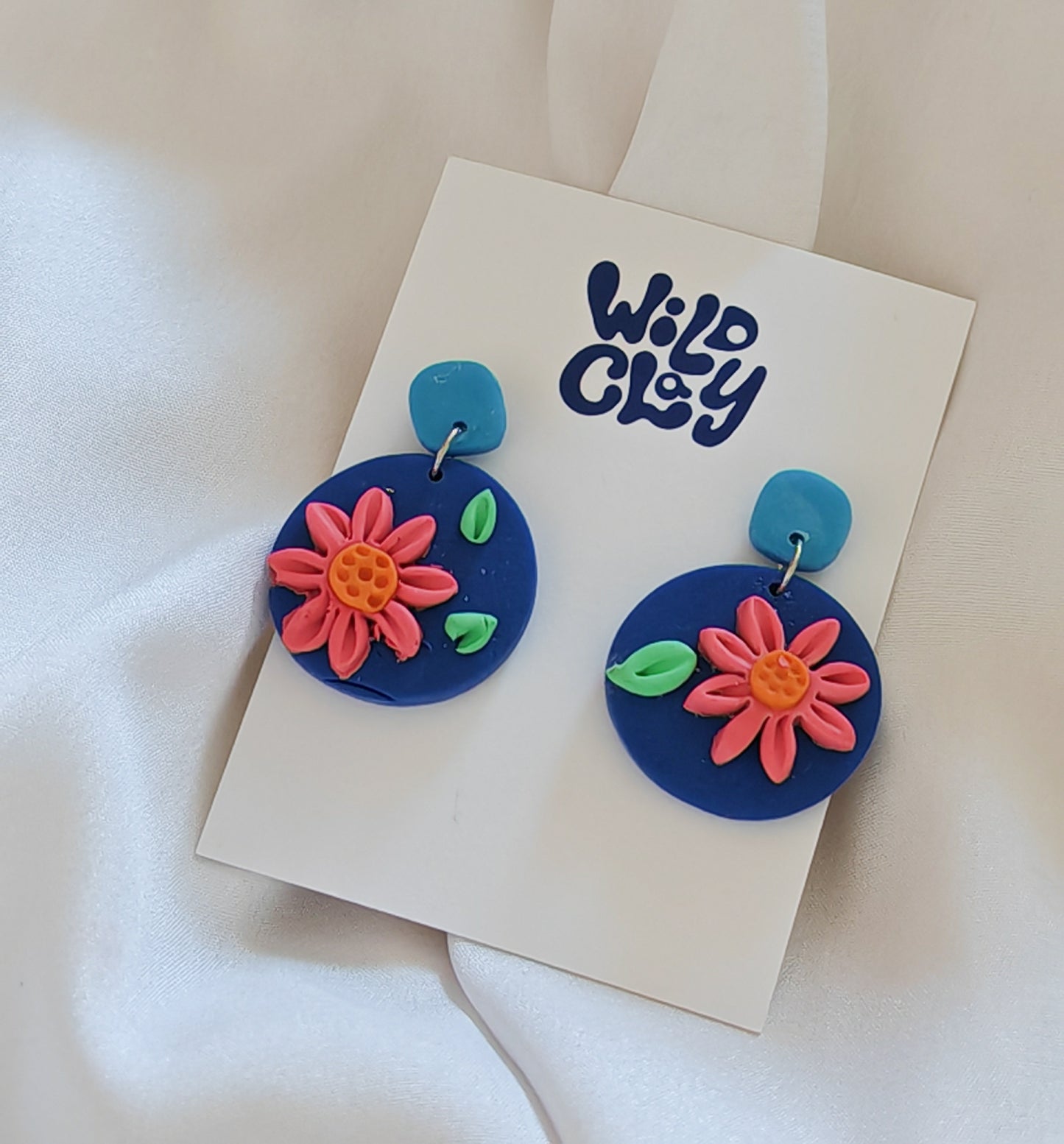 Blue floral dangle drop earrings