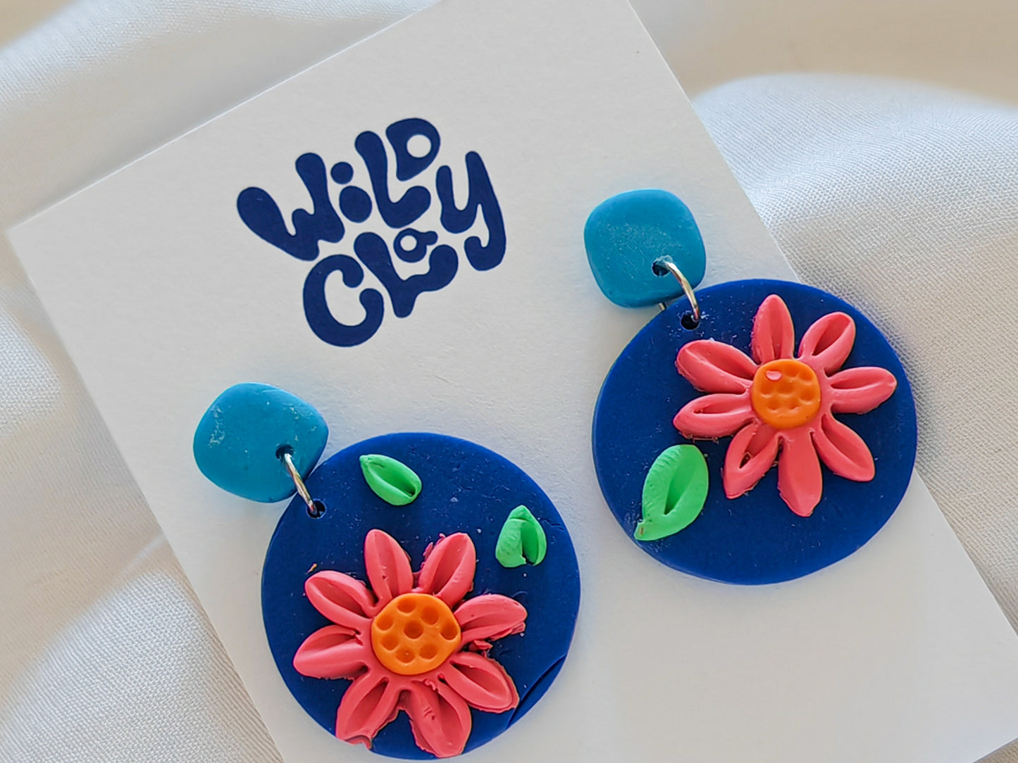 Blue floral dangle drop earrings