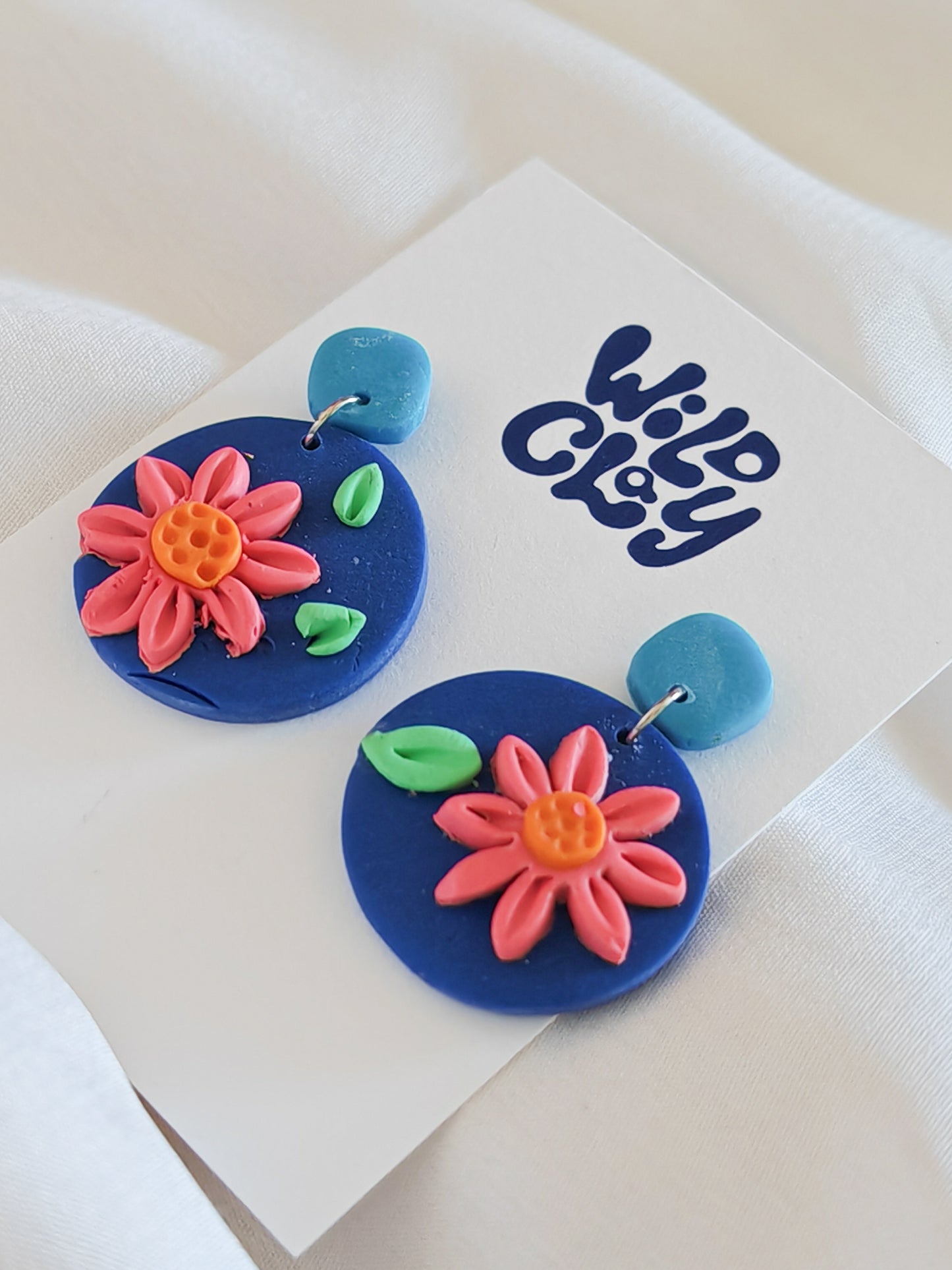 Blue floral dangle drop earrings