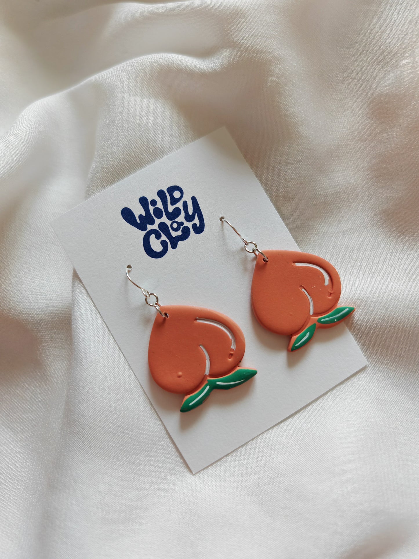 Upside down peachy dangles