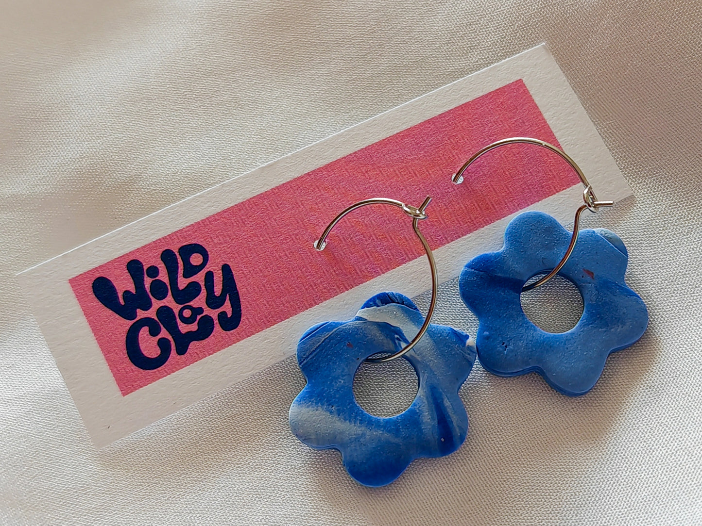 Blue marble flower hoops