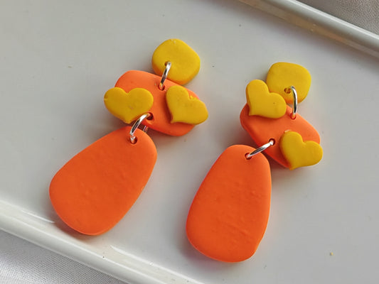 Orange and yellow heart detail dangle earrings