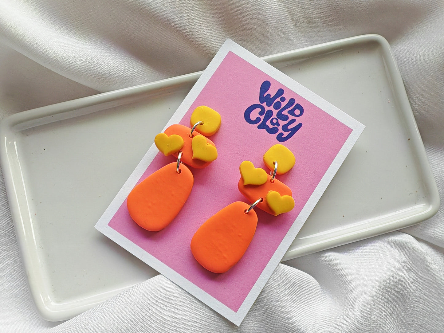 Orange and yellow heart detail dangle earrings