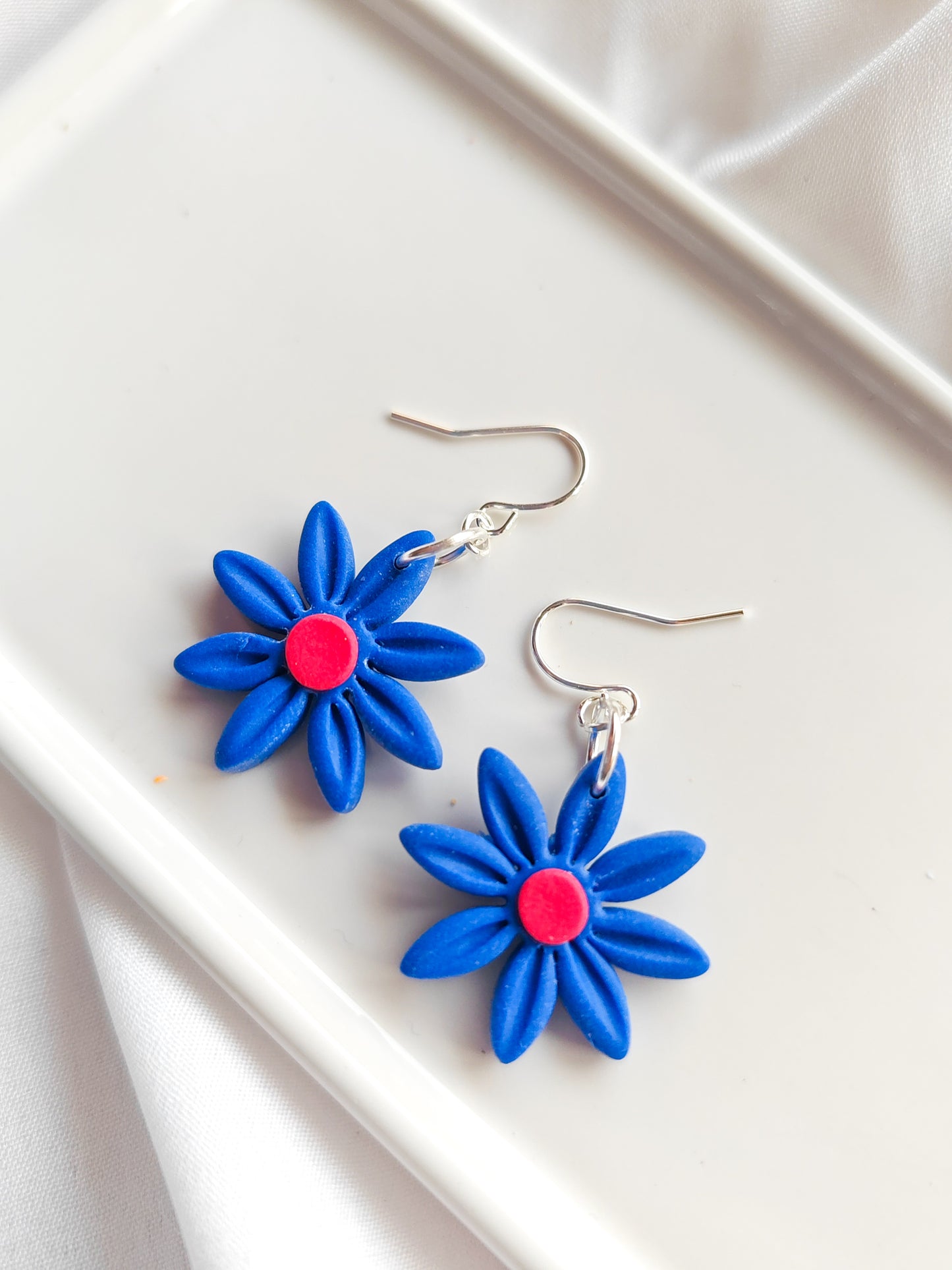Blue daisy earrings