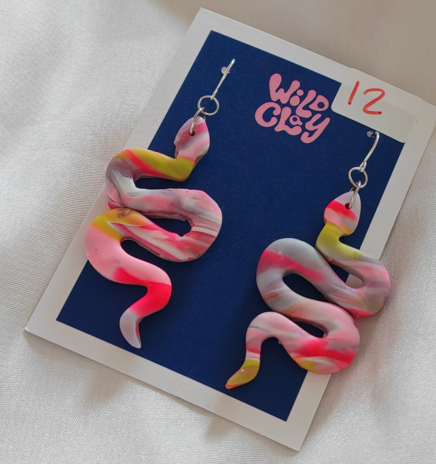 Pink snake marble earrings