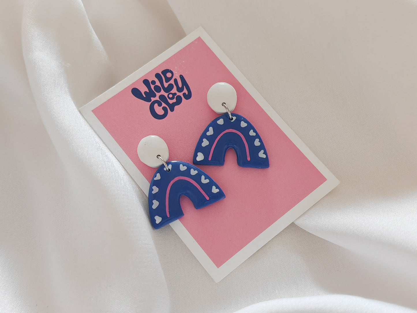 Blue and white arch earrings